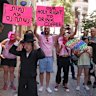 A young ultra-Orthodox protester stands his ground outside Cafe Basimta as counter-protesters make their point. The cafe has now been forced to close.