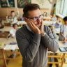 This is a stock photo of a generic stressed teacher, but who is to say it doesn’t reflect what they’re feeling?