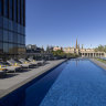 Le Splash rooftop pool overlooks the city skyline.