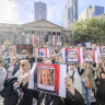 Protesters at last month’s national rally against gender-based violence gather outside the State Library.