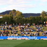 The crowd builds up ahead of  the round 22 NRL match between Wests Tigers and the Rabbitohs at Scully Park