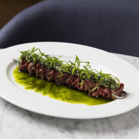Robata-cooked skewer of beef tongue with Sichuan pepper.