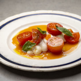 Cherry tomatoes, whipped cod roe and salmon pearls.