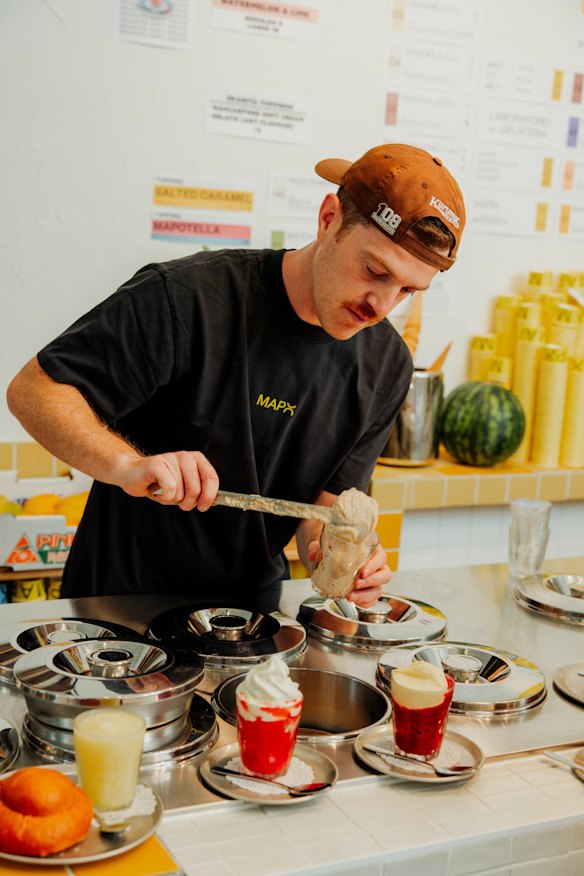 Owner Matteo Pochintesta prepares granita.