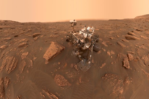 NASA rover Curiosity takes a selfie via a camera on the end of its robotic arm at Gale Crater on Mars. This panorama is made up of 57 individual images stitched together.