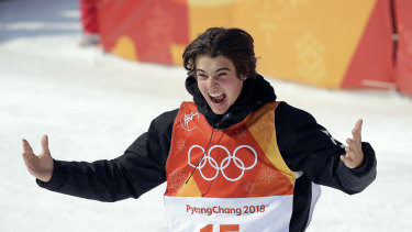 Teen dream: Nico Porteous celebrates after winning his bronze medal.
