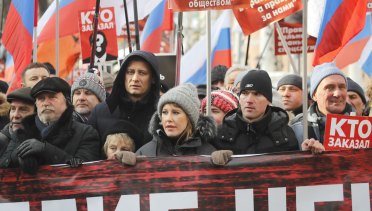 Russian TV host and presidential candidate Ksenia Sobchak, centre, attends a rally in memory of slain opposition leader Boris Nemtsov in Moscow in February.