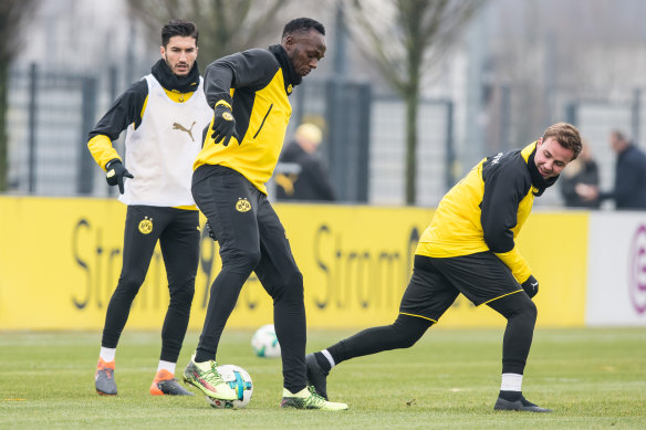 On the ball: Usain Bolt during a training session with Borussia Dortmund.