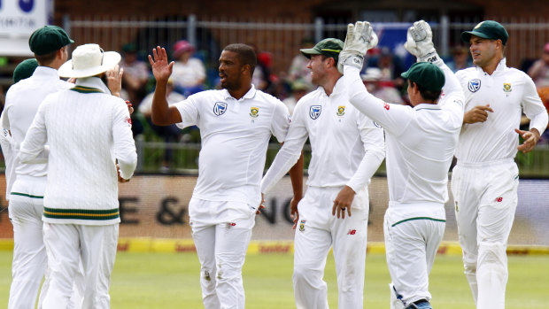 Vernon Philander (centre) denies being the author of a tweet attacking Steve Smith.
