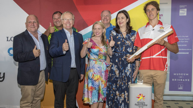 (From left) Commonwealth Games Australia CEO Craig Phillips, Cook Islands Commonwealth Games Federation Representative Hugh Graham, Gold Coast Commonwealth Games chairman Peter Beattie, Queensland minister for the Commonwealth Games Kate Jones, Gold Coast Commonwealth Games CEO Mark Peters, Queensland Premier Annastacia Palaszczuk and Swimmer Cameron McEvoy pose for a photograph with the Queen's baton at Brisbane International Airport on Saturday.