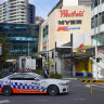 A police officer stands at police cordon near a crime scene at Bondi Junction in Sydney, Monday, April 15, 2024, after several people were stabbed to death at a shopping, Saturday April 13. Australian police are examining why a lone assailant who stabbed multiple people to death in a busy Sydney shopping mall and injured more than a dozen others targeted women while avoiding men. (AP Photo/Mark Baker)