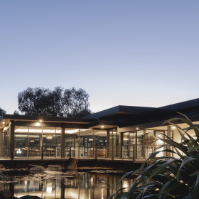 The restaurant is located beside the river in Newtown.