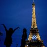 Team USA athletic trainer Amarilees Bolorin, left, poses for a selfie in front of the Eiffel Tower ahead of the 2024 Summer Olympics, in Paris, France.