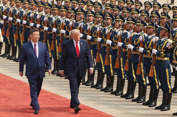 Xi Jinping and Donald Trump at the Great Hall of the People in Beijing in May.