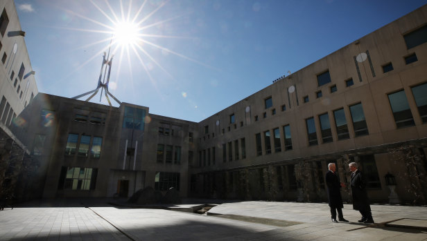 Has the whitefella's Dreaming changed? Prime Minister Malcolm Turnbull and Minister for Indigenous Health Ken Wyatt wait to greet Clinton Pryor at Parliament House on September 6.