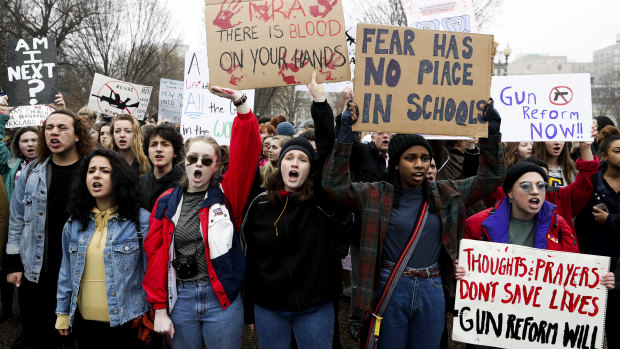 Gun control advocates protesting outside the White House in Washington DC on Monday.