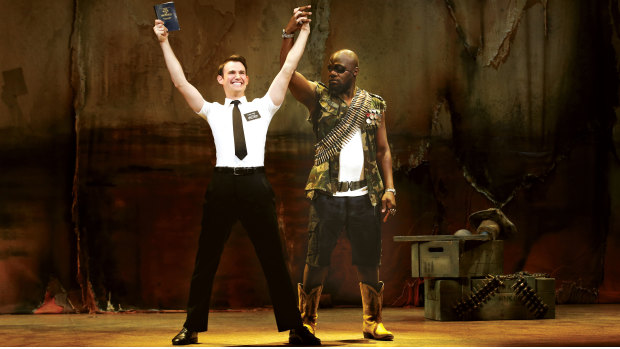 Ryan Bondy as Elder Price, and Augustin Aziz Tchantcho as The General in <em> The Book of Mormon</em>.