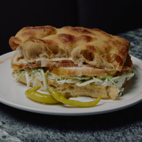 Caffe Amatrice’s porchetta focaccia is worth travelling for.