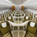 Absence of baggage lockers above middle rows gives an airy, spacious feel.