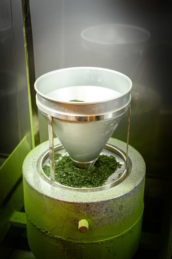Matcha is ground in-house in a stone mill on display for customer viewing.