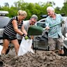 Brisbane residents sandbagging at the Toowong Bowls Club on Friday.