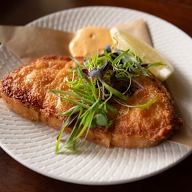 Prawn toast tops an entire slice of sourdough with prawn mousse.