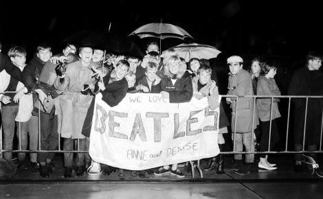 Young fans await the arrival of The Beatles at Sydney Airport on June 18, 1964.