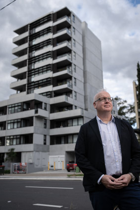 Architect Stephen Cox outside the award-winning apartment block. 