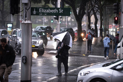 Southern Australia has shivered through a sustained cold snap, such as this downpour in Sydney.