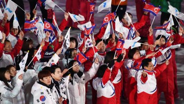 Athletes from North and South Korea enter the stadium for the closing ceremony of the PyeongChang 2018 Olympic Games.