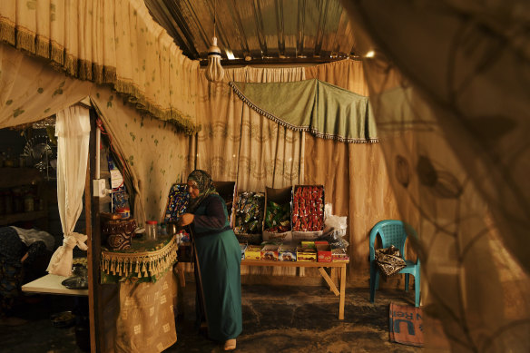 Samiha al-Kelani in the shop in the annex of her tent at Zaatari camp.