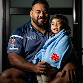 Taniela Tupou with his son Nela.