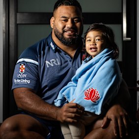 Taniela Tupou with his son Nela.