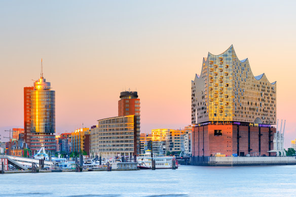 The Hamburg skyline and riverfront with the Elbphilharmonie (Elbe Philharmonic Hall) at right.