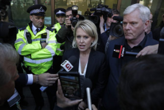 Jennifer Robinson with Wikileaks editor Kristinn Hrafnsson outside court on April 11.