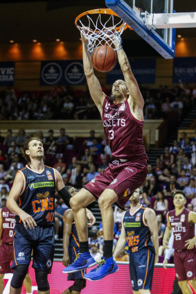 Brisbane centre Tom Jervis, pictured mid-slam dunk, was also instrumental for the Bullets.