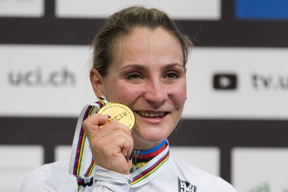 World champion Kristina Vogel of Germany holds her UCI gold medal.