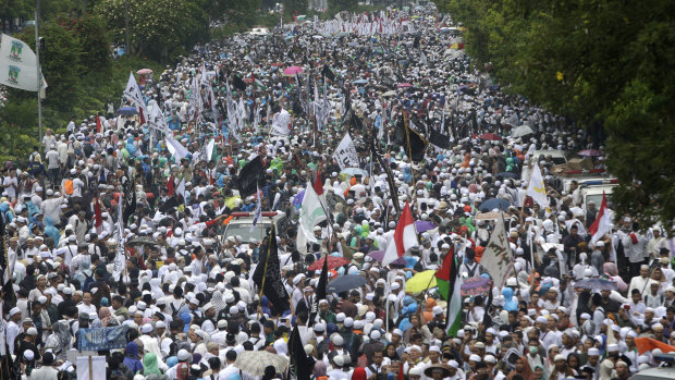 Indonesian Muslims march in a 2016 rally against Jakarta's governor Basuki "Ahok" Tjahaja Purnama, a Christian.