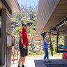 Going up: Former flight attendant Tim Hunt has retrained as a lift operator in Thredbo. 