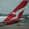 A Qantas plane at Sydney Airport. The airline is increasing the number of points needed to secure Classic Reward flights.