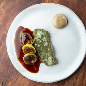 Binnie beef flank, Brussels sprouts, salt bush, onion jus, black garlic. 
