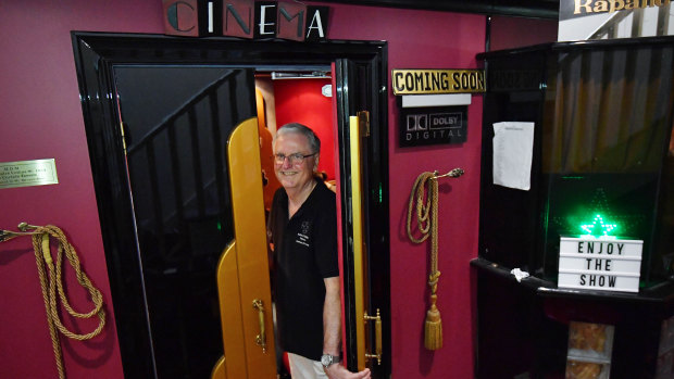 Labour of love: Retired flight attendant Chris Ball hosts free films for locals five nights a week from his Strathmore garage turned plush 14 seat cinema.