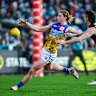 ADELAIDE, AUSTRALIA - JULY 13: Harley Reid of the Eagles kicks past Darcy Byrne-Jones of the Power during the round 18 AFL match between Port Adelaide Power and West Coast Eagles at Adelaide Oval on July 13, 2025 in Adelaide, Australia. (Photo by Mark Brake/Getty Images)