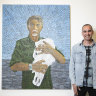 Former refugee Mostafa Azimitabar with his portrait of Angus McDonald, which is a finalist in the Archibald Prize at the Art Gallery of NSW.