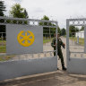 Poland moves troops to border, NATO turns summit into fortress but Wagner base empty