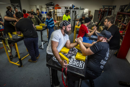 Meat you at training: the House of Pain arm-wrestling club meets at a meat factory’s gym.