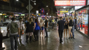 Homeward bound: partygoers fill the streets of Kings Cross on the first weekend of new lockout laws.