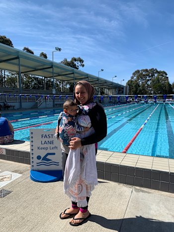 Yusra Metwally with her son Karim at Auburn Pool.
