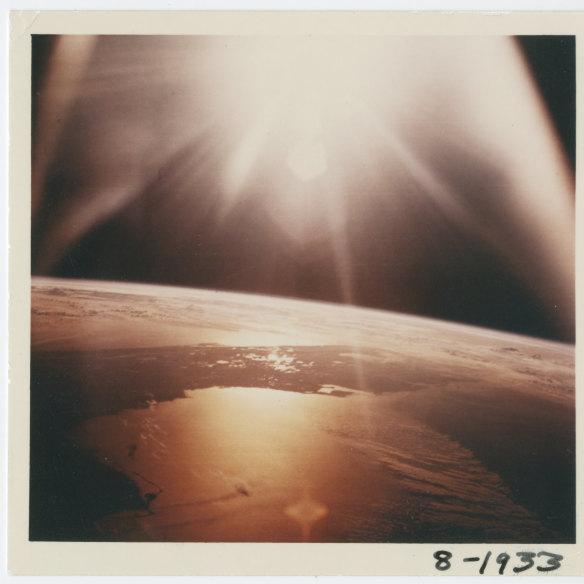 The sun over Florida, from Apollo 7 in 1968. The Earth's orbit around the sun (one solar year) does not line up with its rotation on its axis (one day).