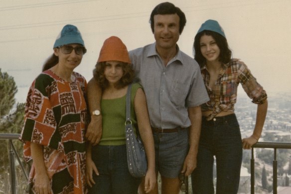 As a teenager (right) with parents Liz and Carl and sister Shellie in 1974.